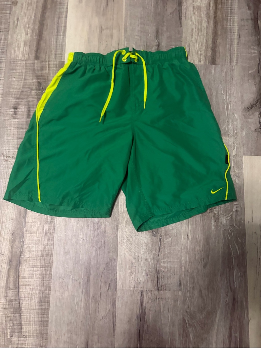 Nike Green Athletic Shorts with Yellow Accents